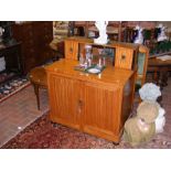 A 19th century satinwood chiffonier from The Royal