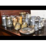 Selection of early pewter tankards, etc.