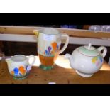 A Clarice Cliff 'Crocus' pattern jug, together wit