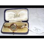 A 9ct gold wrist watch and strap in presentation c