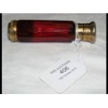 A 19th century ruby glass scent bottle with gilt m