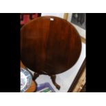 A 100cm diameter circular Victorian mahogany breakfast table