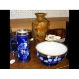 A Doulton stoneware vase, together with bowl and j