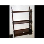 Oriental style three tier hanging shelf with two d