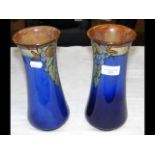 A pair of Royal Doulton stoneware vases with fruit
