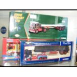 A boxed Corgi Eddie Stobart haulage truck, togethe