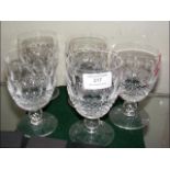 A set of five cut glass Waterford goblets