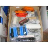 A box of model railway wagons, locos - all unboxed