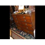 An antique secretaire chest