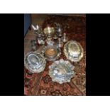 A pair of silver plated tureens and covers, silver