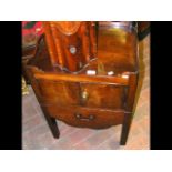 A Georgian mahogany commode