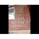 A small antique Middle Eastern style rug with geom