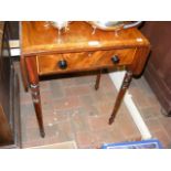 A 19th century mahogany drop-leaf table with cross