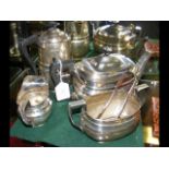 A four piece silver teaset with Sheffield hallmark