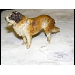 A cold painted dog ornament - 12cm long