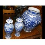 A blue and white oriental vase - 40cm high, togeth