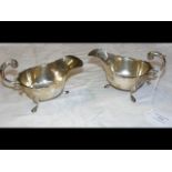 Two silver sauce boats