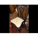Antique side chair with carved cabriole front supp
