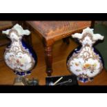 A pair of 42cm high Victorian ceramic vases with w