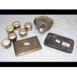 napkin rings, silver cigarette case, etc.