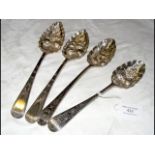 Two pairs of silver berry spoons