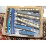 A box of model railway coaches - all unboxed