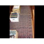 An antique Middle Eastern style rug with geometric