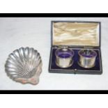A silver shell dish, together with a pair of silve