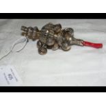 A mid-19th century silver rattle by George Unite w