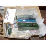 A box of model railway coach parts