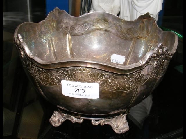 A silver bowl with scroll feet by Garrard & Co., B