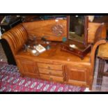 A hardwood hall seat with drawers and cupboards be