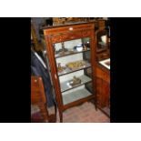 An inlaid Edwardian display cabinet