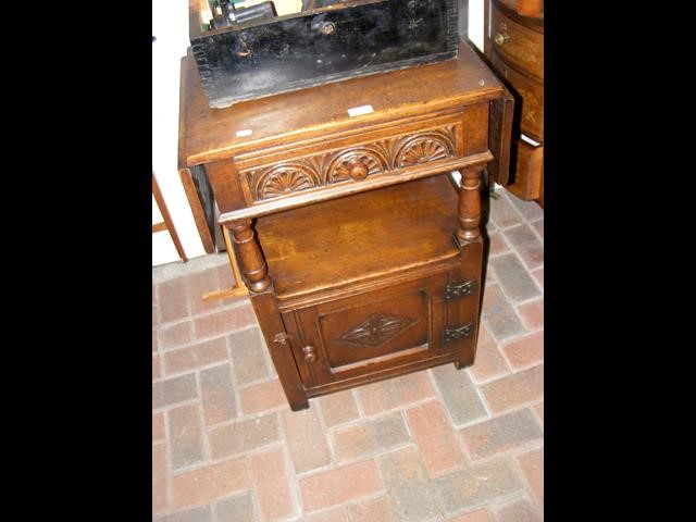 An Ipswich oak drop-leaf side table with cupboard