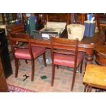 A Victorian extending mahogany dining table on tur