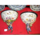 An unusual pair of Dresden ceramic wall brackets,