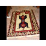 A Middle Eastern rug with fawn and red ground - 17