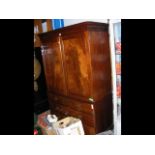 A 19th century mahogany linen press with drawers t