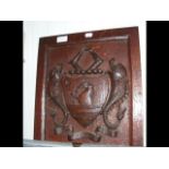 A 19th century oak Coat of Arms inscribed 'Tyme Ty