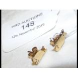 A pair of 9ct gold 'cat' stud earrings