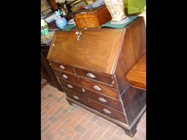 A Georgian mahogany bureau with fitted interior