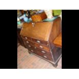 A Georgian mahogany bureau with fitted interior