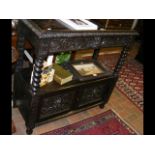 Carved oak buffet with cupboards below