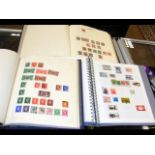 Three albums containing GB and world stamps - Quee