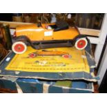 A Structo toy tinplate racing car, together with a