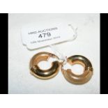 A pair of 9ct gold earrings