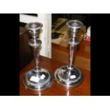 A pair of silver plated candlesticks