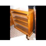 A Victorian oak open bookcase with three shelves -