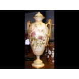 A Royal Worcester two handled vase with hand paint