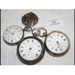 A silver cased pocket watch, together with others